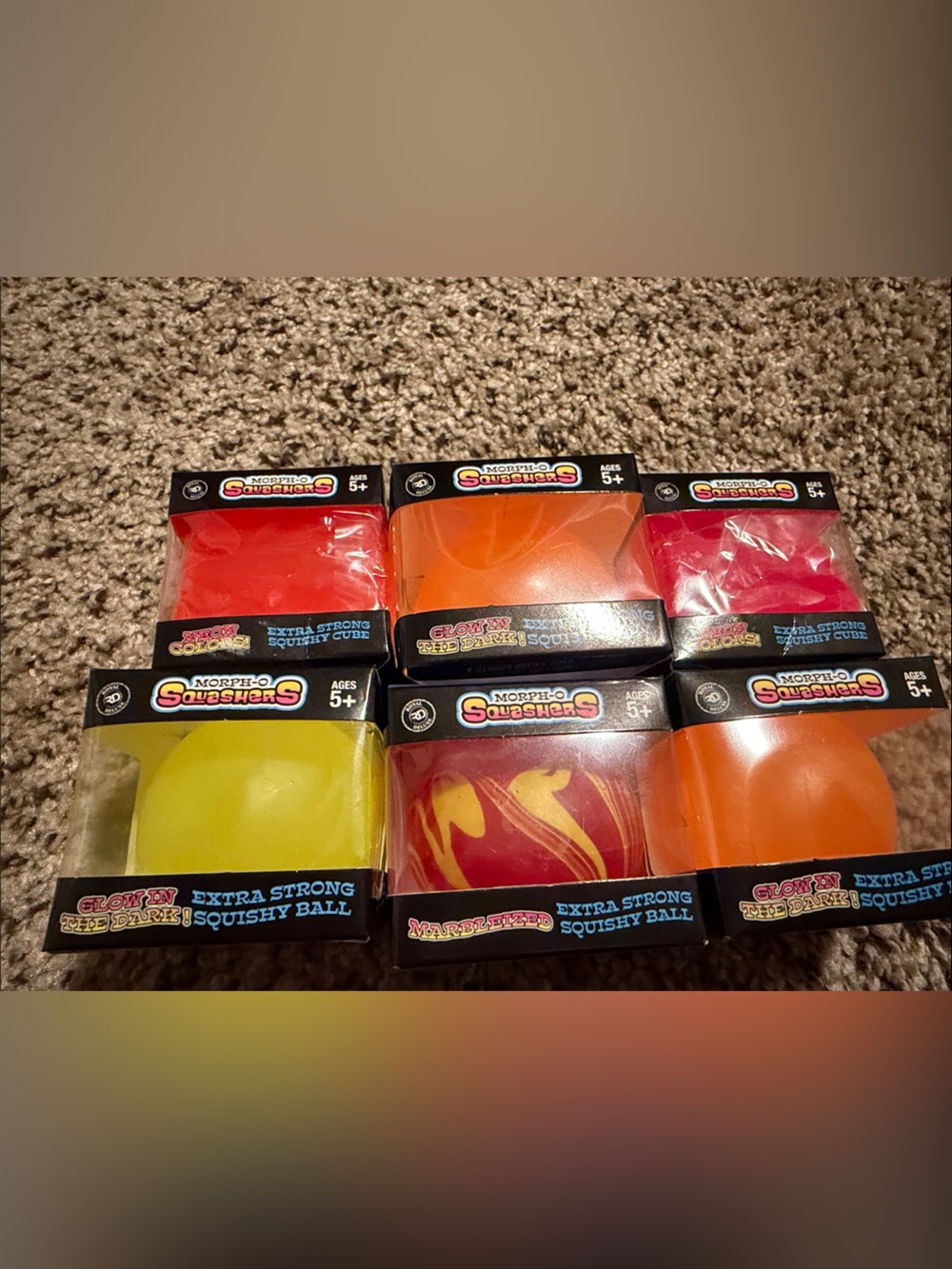 Squishy Squeezers Glow Ball Pack — Yellow, Red, Orange, Pink